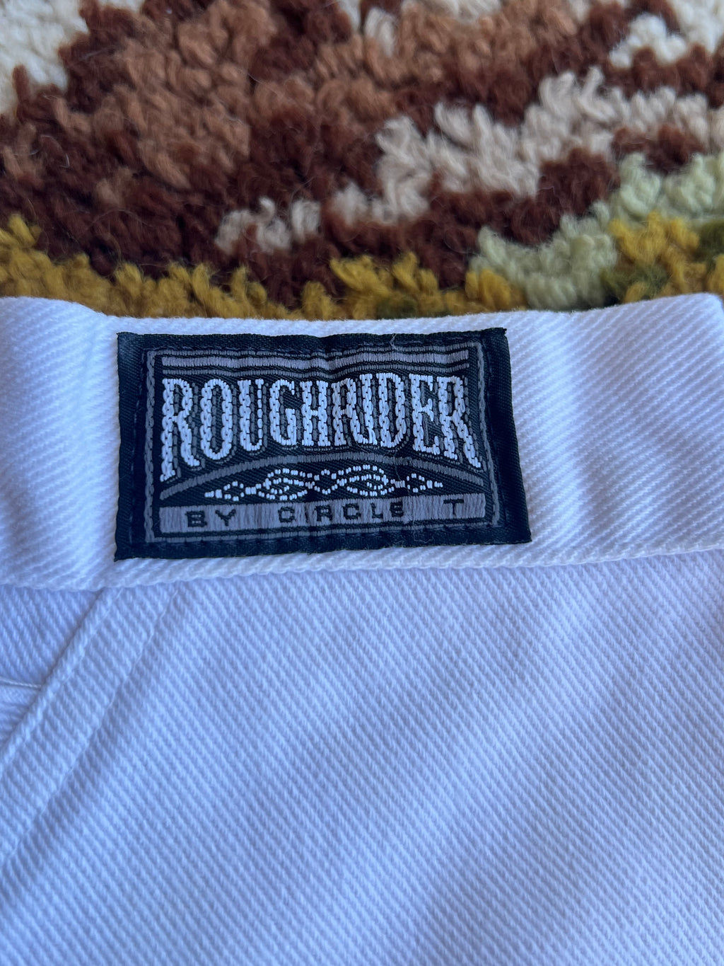 Vintage 1980s Roughrider White Concho Tapered Leg Jeans Size 9/10- MADE IN USA